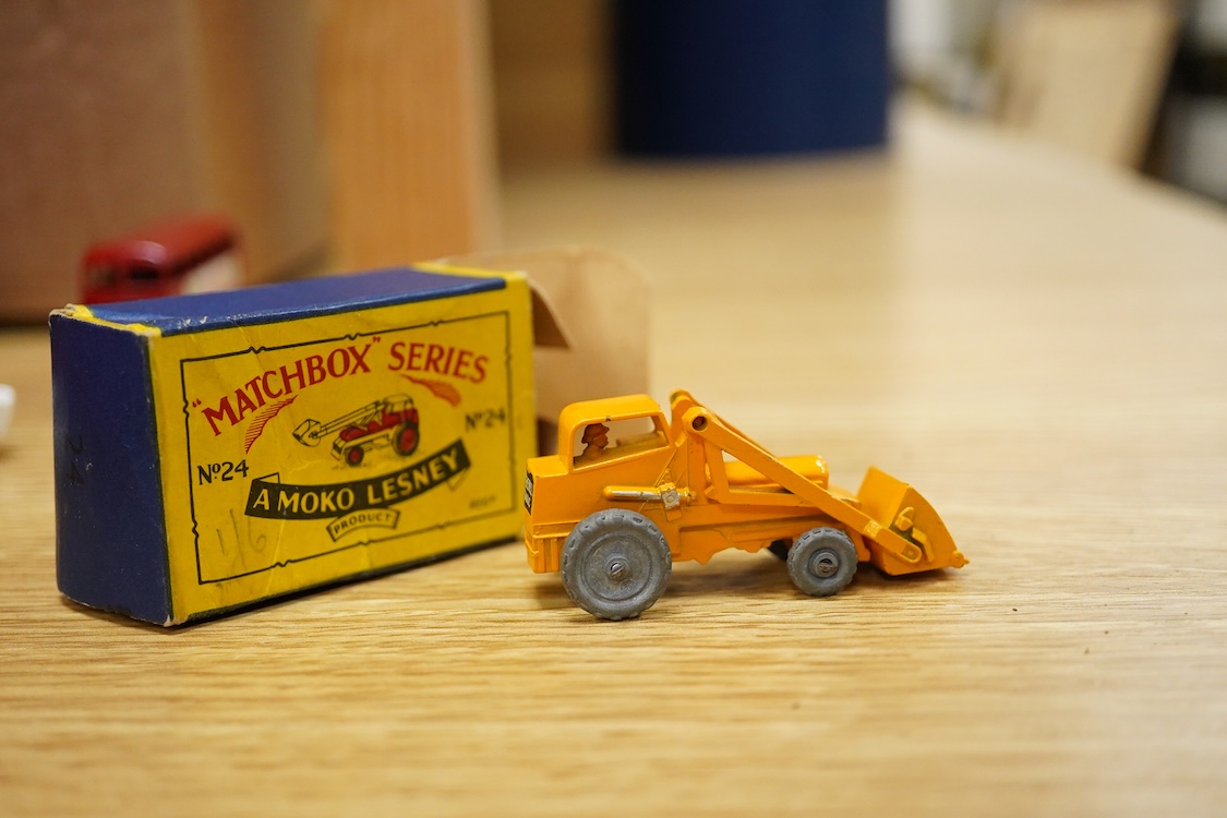 Fifteen boxed Matchbox Series 1-75 regular wheels vehicles including; Trojan van (47), Routemaster bus (5), Cement Lorry (26), Ford G.T. Racing Car (41), Ford Zephyr (33), Long Distance Coach (40), etc.